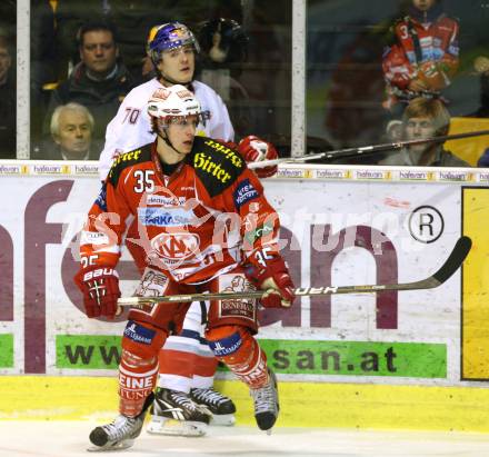 EBEL. Eishockey Bundesliga. KAC gegen EC Red Bull Salzburg. HOLZER Nikolaus (KAC), Poeck Markus (Salzburg). Klagenfurt, am 26.2.2012.
Foto: Kuess

---
pressefotos, pressefotografie, kuess, qs, qspictures, sport, bild, bilder, bilddatenbank