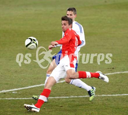 Fussball Laenderspiel. Oesterreich gegen Finnland. Martin Harnik, (Oesterreich), Jukka Raitala  (Finnland). Klagenfurt Woerthersee Stadion, 29.2.2012.
Foto: Kuess

---
pressefotos, pressefotografie, kuess, qs, qspictures, sport, bild, bilder, bilddatenbank