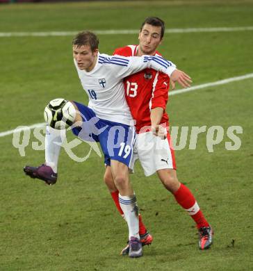 Fussball Laenderspiel. Oesterreich gegen Finnland. Markus Suttner,  (Oesterreich), Alexander Ring (Finnland). Klagenfurt Woerthersee Stadion, 29.2.2012.
Foto: Kuess

---
pressefotos, pressefotografie, kuess, qs, qspictures, sport, bild, bilder, bilddatenbank