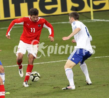 Fussball Laenderspiel. Oesterreich gegen Finnland. Martin Harnik,  (Oesterreich), Joona Toivio (Finnland). Klagenfurt Woerthersee Stadion, 29.2.2012.
Foto: Kuess

---
pressefotos, pressefotografie, kuess, qs, qspictures, sport, bild, bilder, bilddatenbank