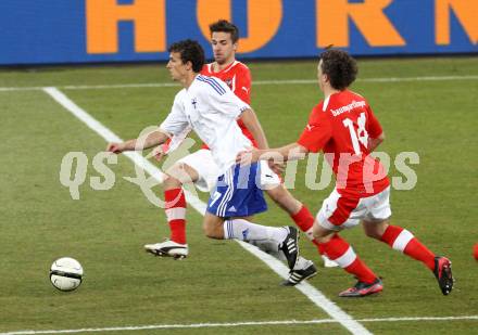 Fussball Laenderspiel. Oesterreich gegen Finnland. Martin Harnik, Julian Baumgartlinger,  (Oesterreich), Roman Eremenko (Finnland). Klagenfurt Woerthersee Stadion, 29.2.2012.
Foto: Kuess

---
pressefotos, pressefotografie, kuess, qs, qspictures, sport, bild, bilder, bilddatenbank