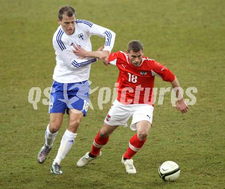 Fussball Laenderspiel. Oesterreich gegen Finnland. Juergen Saeumel,  (Oesterreich), Njazi Kugi (Finnland). Klagenfurt Woerthersee Stadion, 29.2.2012.
Foto: Kuess

---
pressefotos, pressefotografie, kuess, qs, qspictures, sport, bild, bilder, bilddatenbank