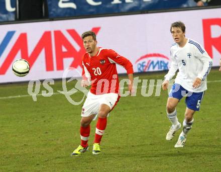 Fussball Laenderspiel. Oesterreich gegen Finnland. Guido Burgstaller, (Oesterreich), Veli Lampi  (Finnland). Klagenfurt Woerthersee Stadion, 29.2.2012.
Foto: Kuess

---
pressefotos, pressefotografie, kuess, qs, qspictures, sport, bild, bilder, bilddatenbank