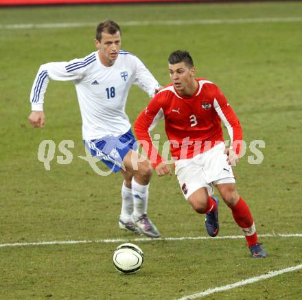 Fussball Laenderspiel. Oesterreich gegen Finnland. Aleksandar Dragovic, (Oesterreich), Njazi Kugi  (Finnland). Klagenfurt Woerthersee Stadion, 29.2.2012.
Foto: Kuess

---
pressefotos, pressefotografie, kuess, qs, qspictures, sport, bild, bilder, bilddatenbank