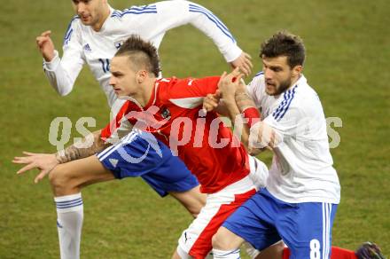 Fussball Laenderspiel. Oesterreich gegen Finnland. Marko Arnautovic, j (Oesterreich), Perparim Hetema (Finnland). Klagenfurt Woerthersee Stadion, 29.2.2012.
Foto: Kuess

---
pressefotos, pressefotografie, kuess, qs, qspictures, sport, bild, bilder, bilddatenbank