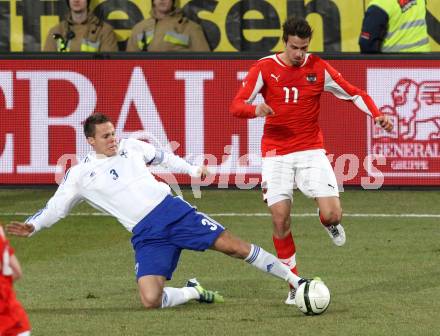 Fussball Laenderspiel. Oesterreich gegen Finnland. Martin Harnik,  (Oesterreich), Niklas Moisander (Finnland). Klagenfurt Woerthersee Stadion, 29.2.2012.
Foto: Kuess

---
pressefotos, pressefotografie, kuess, qs, qspictures, sport, bild, bilder, bilddatenbank