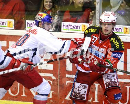EBEL. Eishockey Bundesliga. KAC gegen EC Red Bull Salzburg. HUNDERTPFUND Thomas (KAC), EARL Robert (Salzburg). Klagenfurt, am 1.3.2012.
Foto: Kuess

---
pressefotos, pressefotografie, kuess, qs, qspictures, sport, bild, bilder, bilddatenbank