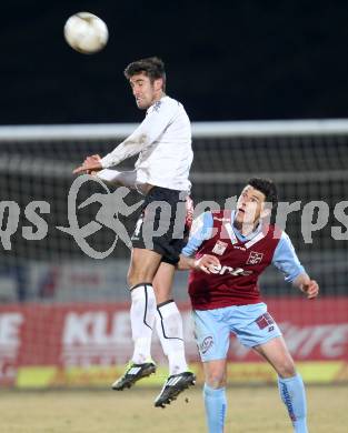 Fussball. Erste Liga.  WAC/St. Andrae gegen BW Linz. Gernot Suppan, (WAC), Manuel Hartl  (Linz). Wolfsberg, 2.3.2012. 
Foto: Kuess

---
pressefotos, pressefotografie, kuess, qs, qspictures, sport, bild, bilder, bilddatenbank