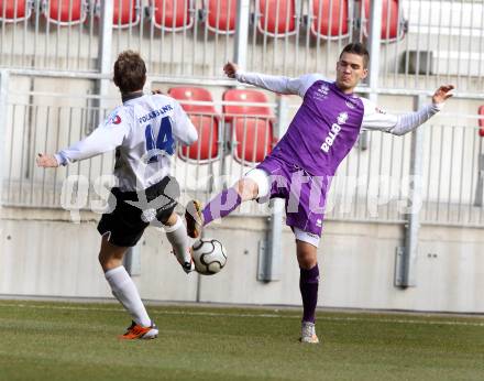 Fussball Testspiel. Sk Austria Klagenfurt gegen Spittal/Drau. Toni Krijan, (Klagenfurt), Marco Moser (Spittal). Klagenfurt, am 2.3.2012.
Foto: Kuess

---
pressefotos, pressefotografie, kuess, qs, qspictures, sport, bild, bilder, bilddatenbank