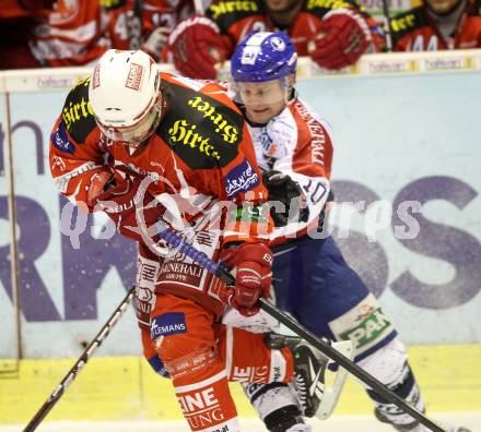 EBEL. Eishockey Bundesliga. KAC gegen KHL Medvescak Zagreb. Thomas Koch,  (KAC), Tomislav Zanoski (Zagreb). Klagenfurt, am 8.3.2012.
Foto: Kuess

---
pressefotos, pressefotografie, kuess, qs, qspictures, sport, bild, bilder, bilddatenbank