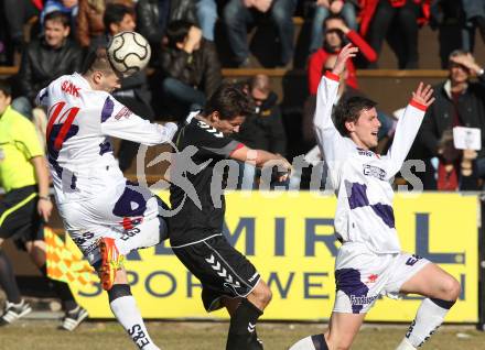 Fussball Regionalliga. SAK gegen St. Florian. Christian Dlopst, Darjan Aleksic (SAK), Markus Hermes (St. Florian). Klagenfurt, am 10.3.2012.
Foto: Kuess
---
pressefotos, pressefotografie, kuess, qs, qspictures, sport, bild, bilder, bilddatenbank