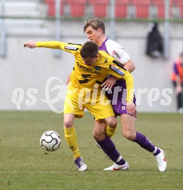 Fussball. Regionalliga.  SK Austria Klagenfurt gegen Pasching. Peter Pucker, (Klagenfurt), Matthias Oettl (Pasching). Klagenfurt, 11.3.2012. 
Foto: Kuess

---
pressefotos, pressefotografie, kuess, qs, qspictures, sport, bild, bilder, bilddatenbank