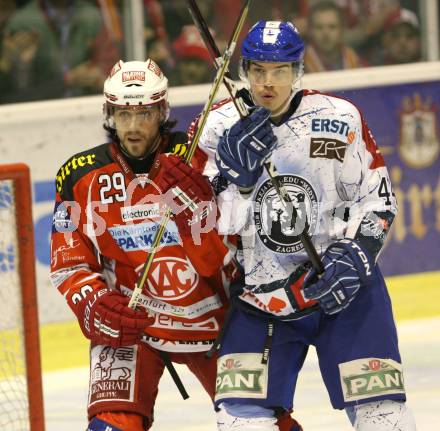 EBEL. Eishockey Bundesliga. KAC gegen KHL Medvescak Zagreb. Christoph Brandner (KAC), Geoff Waugh (Zagreb). Klagenfurt, am 13.3.2012.
Foto: Kuess

---
pressefotos, pressefotografie, kuess, qs, qspictures, sport, bild, bilder, bilddatenbank