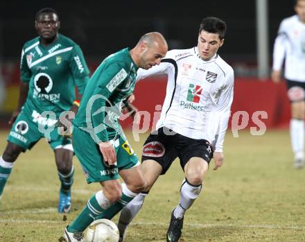 Fussball. Erste Liga. WAC/St. Andrae gegen SC Austria Lustenau. Roland Putsche (WAC), Harald Duerr (Lustenau). Wolfsberg, 16.3.2012. 
Foto: Kuess
---
pressefotos, pressefotografie, kuess, qs, qspictures, sport, bild, bilder, bilddatenbank