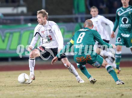 Fussball. Erste Liga. WAC/St. Andrae gegen SC Austria Lustenau. Danijel Micic (WAC), Harald Duerr (Lustenau). Wolfsberg, 16.3.2012. 
Foto: Kuess
---
pressefotos, pressefotografie, kuess, qs, qspictures, sport, bild, bilder, bilddatenbank