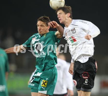 Fussball. Erste Liga. WAC/St. Andrae gegen SC Austria Lustenau. Christian Falk (WAC), Juergen Kampel (Lustenau). Wolfsberg, 16.3.2012. 
Foto: Kuess
---
pressefotos, pressefotografie, kuess, qs, qspictures, sport, bild, bilder, bilddatenbank