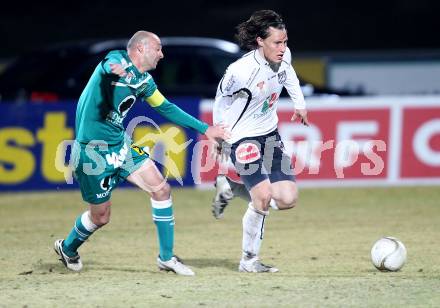 Fussball. Erste Liga. WAC/St. Andrae gegen SC Austria Lustenau. Dario Baldauf (WAC), Harald Duerr (Lustenau). Wolfsberg, 16.3.2012. 
Foto: Kuess
---
pressefotos, pressefotografie, kuess, qs, qspictures, sport, bild, bilder, bilddatenbank