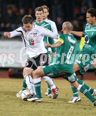 Fussball. Erste Liga.  WAC/St. Andrae gegen SC Austria Lustenau. Michael Sollbauer, (WAC), Harald Duerr  (Lustenau). Wolfsberg, 16.3.2012. 
Foto: Kuess

---
pressefotos, pressefotografie, kuess, qs, qspictures, sport, bild, bilder, bilddatenbank