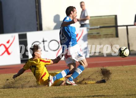 Fussball Regionalliga. VSV gegen KSV Kapfenberg Amateure. Rok Pavlicic (VSV), Moritz Guetz (KSV). Villach, am 17.3.2012.
Foto: Kuess
---
pressefotos, pressefotografie, kuess, qs, qspictures, sport, bild, bilder, bilddatenbank