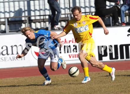 Fussball Regionalliga. VSV gegen KSV Kapfenberg Amateure. Johannes Isopp (VSV), Ivica Lucic (KSV). Villach, am 17.3.2012.
Foto: Kuess
---
pressefotos, pressefotografie, kuess, qs, qspictures, sport, bild, bilder, bilddatenbank