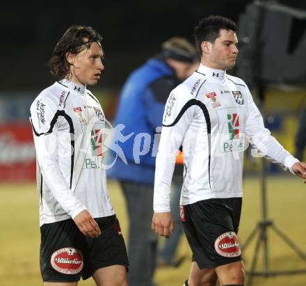 Fussball. Erste Liga. WAC/St. Andrae gegen SC Austria Lustenau. Enttaeuscht. Dario Baldauf, Roland Putsche (WAC). Wolfsberg, 16.3.2012. 
Foto: Kuess
---
pressefotos, pressefotografie, kuess, qs, qspictures, sport, bild, bilder, bilddatenbank