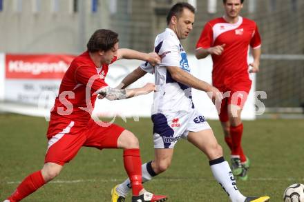 Fussball Regionalliga. SAK gegen Leoben. Goran Jolic,  (SAK), Gergely Fuefza  (Leoben). Klagenfurt, 24.3.2012.
Foto: Kuess
---
pressefotos, pressefotografie, kuess, qs, qspictures, sport, bild, bilder, bilddatenbank