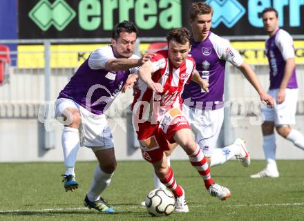 Fussball Regionalliga. SK Austria Klagenfurt gegen GAK. Almedin Hota,  (Austira Klagenfurt), Michael Hofer (GAK). Klagenfurt, 25.3.2012
Foto: Kuess

---
pressefotos, pressefotografie, kuess, qs, qspictures, sport, bild, bilder, bilddatenbank