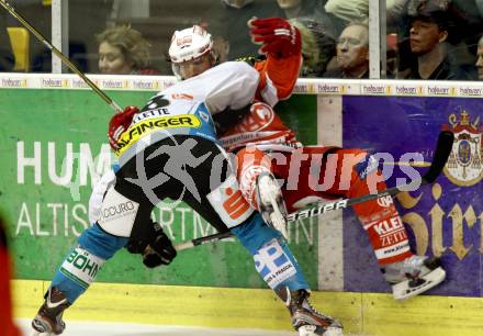 EBEL. Eishockey Bundesliga. KAC gegen EHC LIWEST Black Wings Linz. Christoph Brander, (KAC), Mike Ouellette  (Linz). Klagenfurt, am 25.3.2012.
Foto: Kuess

---
pressefotos, pressefotografie, kuess, qs, qspictures, sport, bild, bilder, bilddatenbank