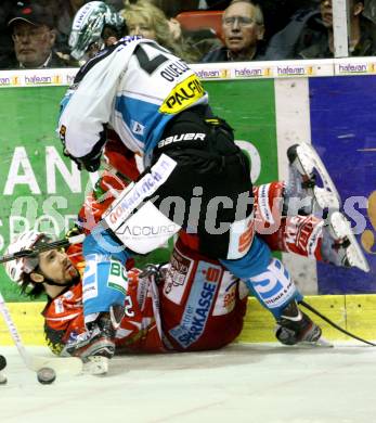 EBEL. Eishockey Bundesliga. KAC gegen EHC LIWEST Black Wings Linz. Christoph Brandner,  (KAC), Mike Ouellette (Linz). Klagenfurt, am 25.3.2012.
Foto: Kuess

---
pressefotos, pressefotografie, kuess, qs, qspictures, sport, bild, bilder, bilddatenbank