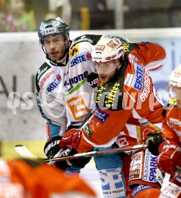 EBEL. Eishockey Bundesliga. KAC gegen EHC LIWEST Black Wings Linz. Tyler Spurgeon,  (KAC), Mike Ouellette (Linz). Klagenfurt, am 25.3.2012.
Foto: Kuess

---
pressefotos, pressefotografie, kuess, qs, qspictures, sport, bild, bilder, bilddatenbank