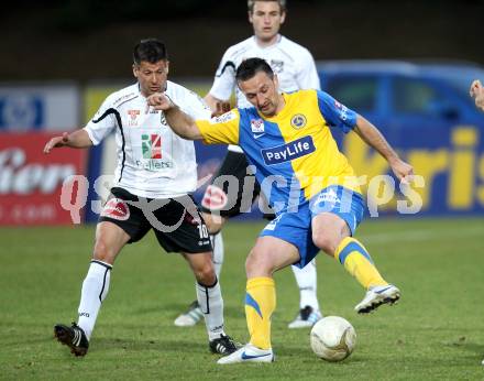 Fussball. Erste Liga.  WAC/St. Andrae gegen Vienna. Markus Kreuz, (WAC), Rade Djokic (Vienna). Wolfsberg, 27.3.2012. 
Foto: Kuess

---
pressefotos, pressefotografie, kuess, qs, qspictures, sport, bild, bilder, bilddatenbank