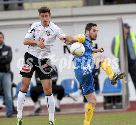 Fussball. Erste Liga.  WAC/St. Andrae gegen Vienna. Gernor Suppan,  (WAC), Wolfgang Mair (Vienna). Wolfsberg, 27.3.2012. 
Foto: Kuess

---
pressefotos, pressefotografie, kuess, qs, qspictures, sport, bild, bilder, bilddatenbank