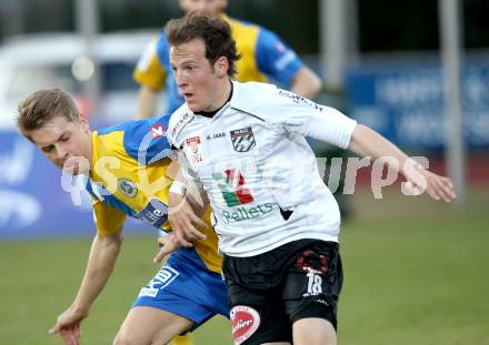 Fussball. Erste Liga.  WAC/St. Andrae gegen Vienna. Mario Kroepfl,  (WAC), Julian Erhart (Vienna). Wolfsberg, 27.3.2012. 
Foto: Kuess

---
pressefotos, pressefotografie, kuess, qs, qspictures, sport, bild, bilder, bilddatenbank