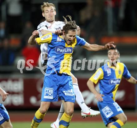 Fussball. Erste Liga.  WAC/St. Andrae gegen Vienna. Danijel Micic,  (WAC), Matthias Hattenberger (Vienna). Wolfsberg, 27.3.2012. 
Foto: Kuess

---
pressefotos, pressefotografie, kuess, qs, qspictures, sport, bild, bilder, bilddatenbank