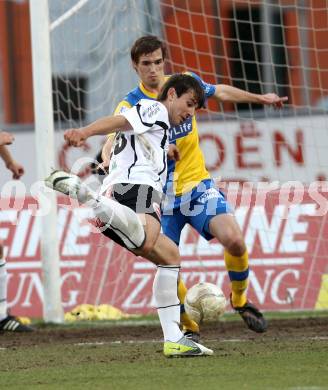 Fussball. Erste Liga.  WAC/St. Andrae gegen Vienna. Mihret Topcagic,  (WAC), Konstantin Kerschbaumer (Vienna). Wolfsberg, 27.3.2012. 
Foto: Kuess

---
pressefotos, pressefotografie, kuess, qs, qspictures, sport, bild, bilder, bilddatenbank