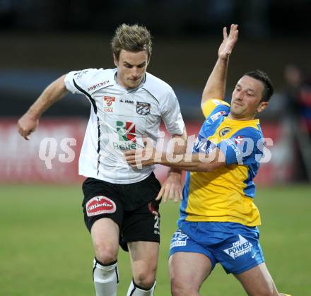 Fussball. Erste Liga.  WAC/St. Andrae gegen Vienna. Michael Sollbauer,  (WAC), Rade Djokic (Vienna). Wolfsberg, 27.3.2012. 
Foto: Kuess

---
pressefotos, pressefotografie, kuess, qs, qspictures, sport, bild, bilder, bilddatenbank