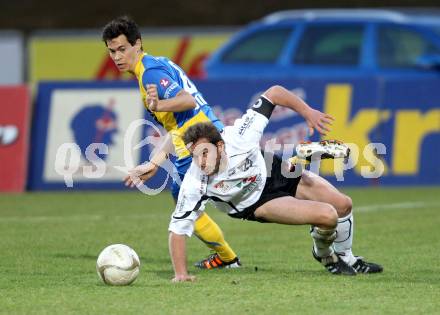 Fussball. Erste Liga.  WAC/St. Andrae gegen Vienna. Gernot Messner,  (WAC), Marcel Toth (Vienna). Wolfsberg, 27.3.2012. 
Foto: Kuess

---
pressefotos, pressefotografie, kuess, qs, qspictures, sport, bild, bilder, bilddatenbank