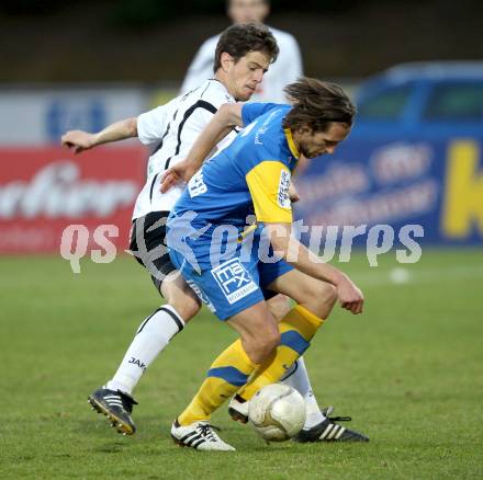 Fussball. Erste Liga.  WAC/St. Andrae gegen Vienna. Christian Falk,  (WAC), Matthias Hattenberger (Vienna). Wolfsberg, 27.3.2012. 
Foto: Kuess

---
pressefotos, pressefotografie, kuess, qs, qspictures, sport, bild, bilder, bilddatenbank