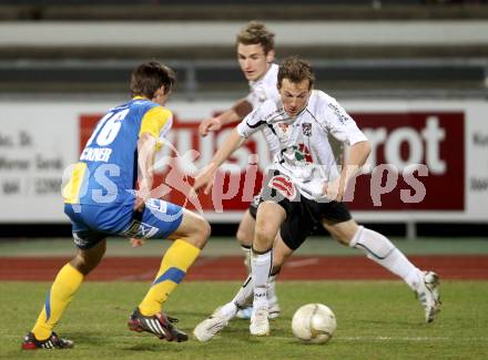 Fussball. Erste Liga.  WAC/St. Andrae gegen Vienna. Mario Kroepfl,  (WAC), Markus Lackner (Vienna). Wolfsberg, 27.3.2012. 
Foto: Kuess

---
pressefotos, pressefotografie, kuess, qs, qspictures, sport, bild, bilder, bilddatenbank