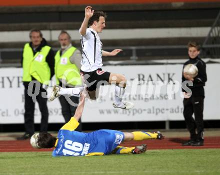 Fussball. Erste Liga.  WAC/St. Andrae gegen Vienna. Mario Kroepfl, (WAC), Markus Lackner  (Vienna). Wolfsberg, 27.3.2012. 
Foto: Kuess

---
pressefotos, pressefotografie, kuess, qs, qspictures, sport, bild, bilder, bilddatenbank