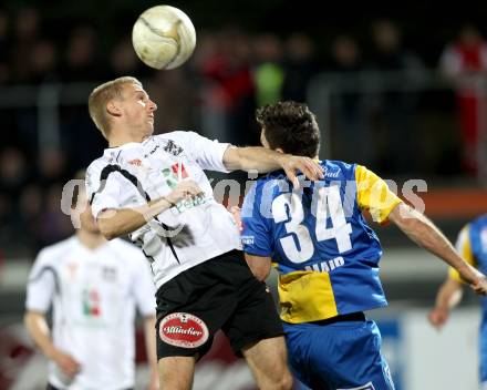 Fussball. Erste Liga.  WAC/St. Andrae gegen Vienna. Manuel Kerhe, (WAC), Wolfgang Mair (Vienna). Wolfsberg, 27.3.2012. 
Foto: Kuess

---
pressefotos, pressefotografie, kuess, qs, qspictures, sport, bild, bilder, bilddatenbank