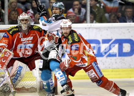 EBEL. Eishockey Bundesliga. KAC gegen EHC LIWEST Black Wings Linz. Andy Chiodo, Johannes Kirisits,  (KAC), Martin Grabher Meier (Linz). Klagenfurt, am 29.3.2012.
Foto: Kuess

---
pressefotos, pressefotografie, kuess, qs, qspictures, sport, bild, bilder, bilddatenbank