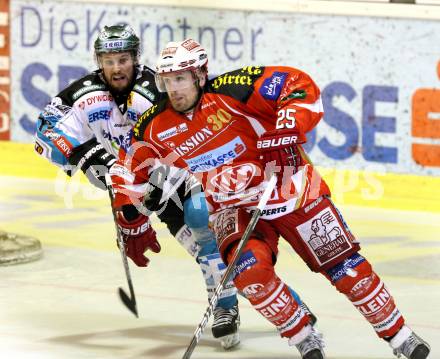 EBEL. Eishockey Bundesliga. KAC gegen EHC LIWEST Black Wings Linz. Kirk Furey,  (KAC), Gregor Baumgartner (Linz). Klagenfurt, am 29.3.2012.
Foto: Kuess

---
pressefotos, pressefotografie, kuess, qs, qspictures, sport, bild, bilder, bilddatenbank