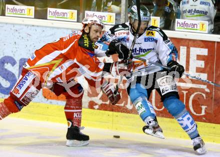 EBEL. Eishockey Bundesliga. KAC gegen EHC LIWEST Black Wings Linz. Johannes Kirisits,  (KAC), Martin Grabher Meier (Linz). Klagenfurt, am 29.3.2012.
Foto: Kuess

---
pressefotos, pressefotografie, kuess, qs, qspictures, sport, bild, bilder, bilddatenbank