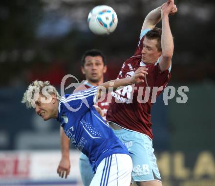 Fussball. Regionalliga. Treibach gegen Feldkirchen SV. Alexander Lessnigg  (Treibach), Michael Wernig (Feldkirchen). Treibach, 30.3.2012.
Foto: Kuess
---
pressefotos, pressefotografie, kuess, qs, qspictures, sport, bild, bilder, bilddatenbank