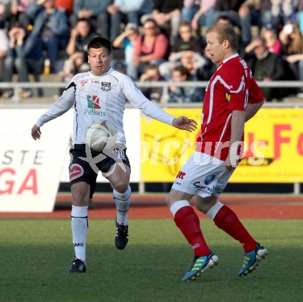 Fussball. Erste Liga.  WAC/St. Andrae gegen SKN St. Poelten. Markus Kreuz, (WAC), Michael Popp (St. Poelten). Wolfsberg, 2.4.2012. 
Foto: Kuess

---
pressefotos, pressefotografie, kuess, qs, qspictures, sport, bild, bilder, bilddatenbank