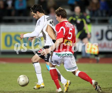 Fussball. Erste Liga.  WAC/St. Andrae gegen SKN St. Poelten. Jacobo,  (WAC), Stephan Zwierschitz (St. Poelten). Wolfsberg, 2.4.2012. 
Foto: Kuess

---
pressefotos, pressefotografie, kuess, qs, qspictures, sport, bild, bilder, bilddatenbank