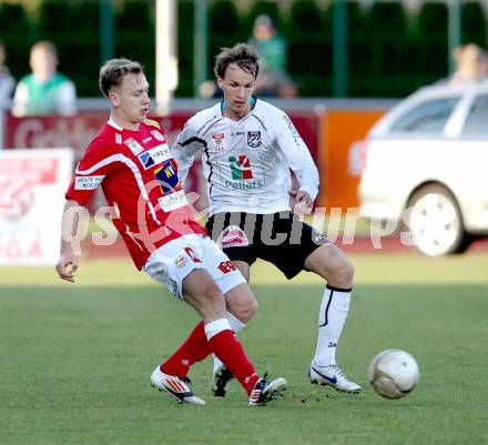 Fussball. Erste Liga.  WAC/St. Andrae gegen SKN St. Poelten. Rene Gsellmann,  (WAC), Dominik Hofbauer (St. Poelten). Wolfsberg, 2.4.2012. 
Foto: Kuess

---
pressefotos, pressefotografie, kuess, qs, qspictures, sport, bild, bilder, bilddatenbank