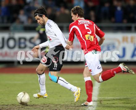 Fussball. Erste Liga.  WAC/St. Andrae gegen SKN St. Poelten. Jacobo,  (WAC), Stephan Zwierschitz (St. Poelten). Wolfsberg, 2.4.2012. 
Foto: Kuess

---
pressefotos, pressefotografie, kuess, qs, qspictures, sport, bild, bilder, bilddatenbank