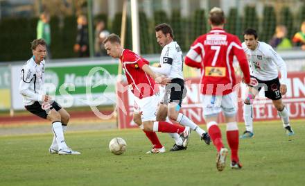 Fussball. Erste Liga.  WAC/St. Andrae gegen SKN St. Poelten. Rene Gsellmann, Gernot Messner, (WAC), Dominik Hofbauer  (St. Poelten). Wolfsberg, 2.4.2012. 
Foto: Kuess

---
pressefotos, pressefotografie, kuess, qs, qspictures, sport, bild, bilder, bilddatenbank